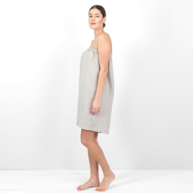 Grey towel with a button waffle