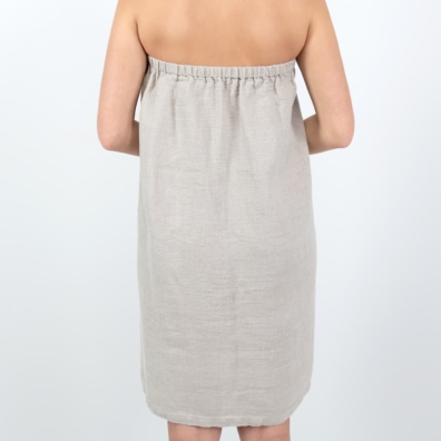 Grey towel with a button from backside