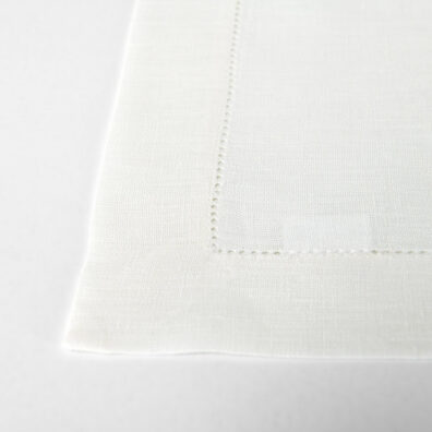White linen placemat, with hemstitching