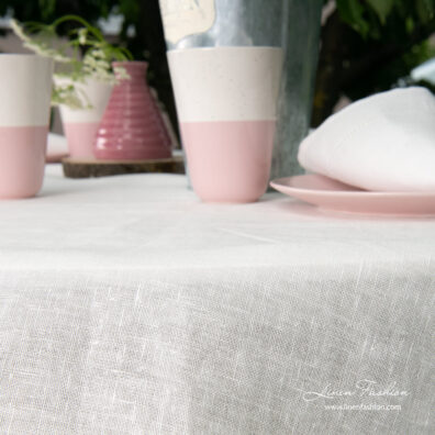 Close view of white linen blend round tablecloth