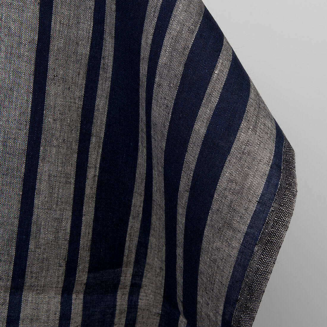 Linen fabric in blue and natural stripes, plain weave