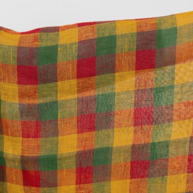 Yellow, green and red checked linen fabric close up detail