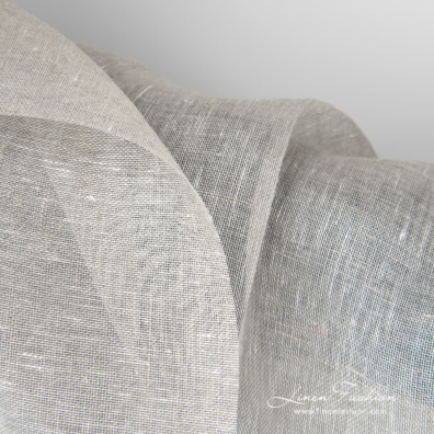 Transparent linen fabric in light grey can be used to make curtains, shawls and other sheer and lightweight textile.