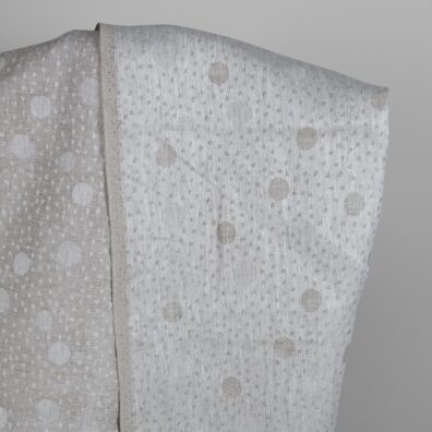 Grey linen fabric in bubble pattern white side
