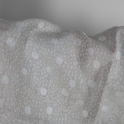 Grey linen fabric in bubble pattern close up detail