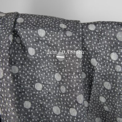 Black linen fabric in bubble pattern with measurements