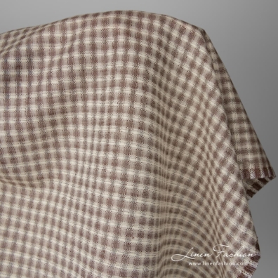 Brown transparent, sheer, sparse linen blend fabric in openwork checked pattern