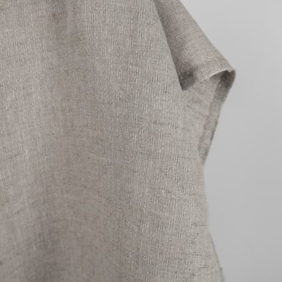 Natural linen fabric in an openwork pattern edge