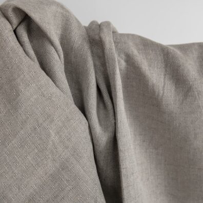 Natural linen fabric in an openwork pattern texture