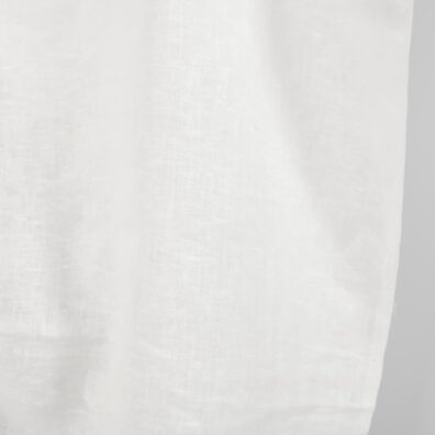 Pure linen fabric in off-white edge