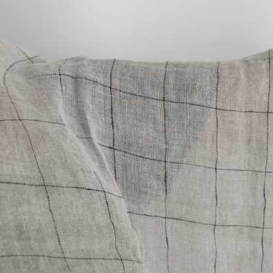 Natural transparent checked linen fabric washed close up detail