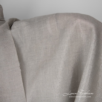 Lightweight grey linen fabric decorated with glittering silver-coloured lurex