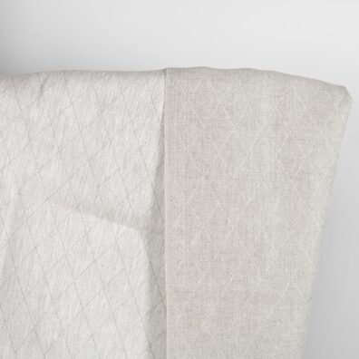 Beige double-sided linen fabric in a diamond pattern