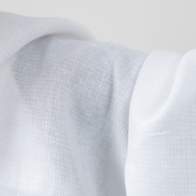 Bright white linen fabric in a small check pattern texture