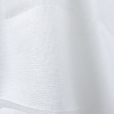 Bright white linen fabric in a small check pattern close up detail