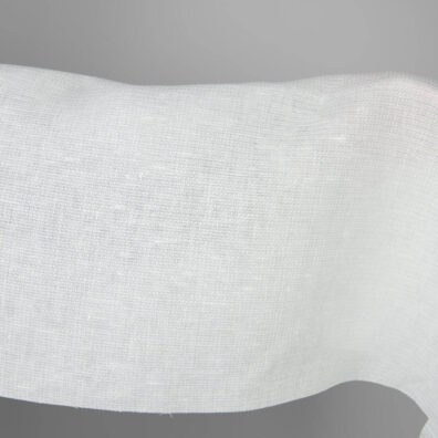 Off-white linen fabric in a small check pattern