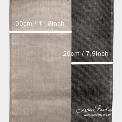 Natural and black stripe measures on narrow linen fabric