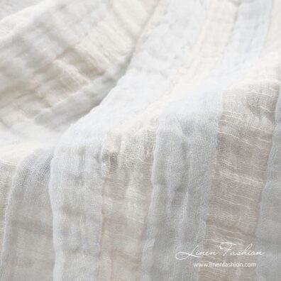 Off-white blanket, madam.