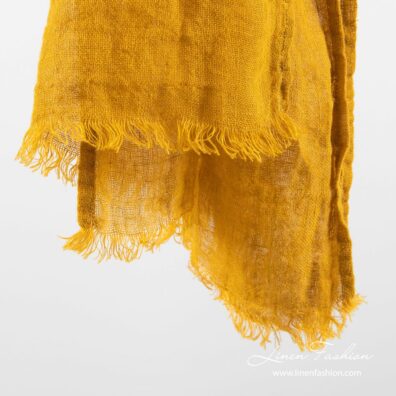 Yellow colored linen shawl.
