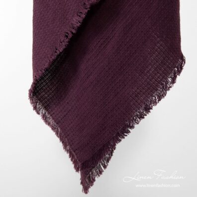 Dark red colored linen-cotton scarf.