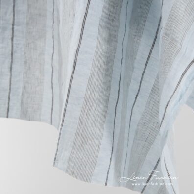 Washed linen fabric in pale blue.