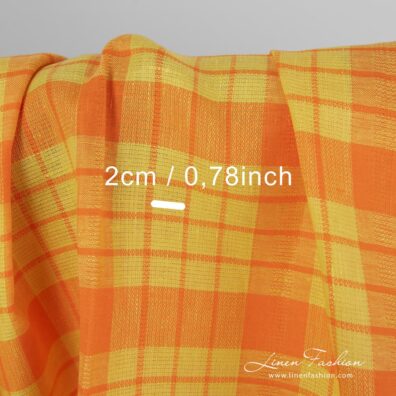 Checked 100% linen fabric, orange-yellow.