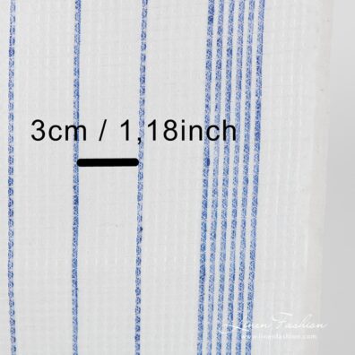 Off white linen fabric with blue stripes.