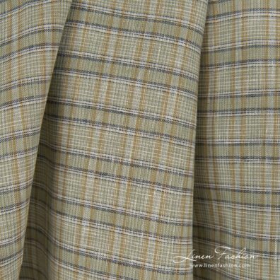 Green dyed 100% linen fabric in checks.