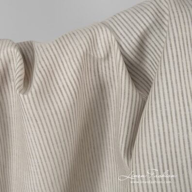 Beige linen fabric in stripes.