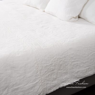 White bed linen.