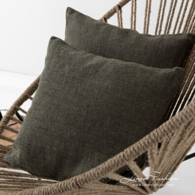 Green cushion covers Mossa.