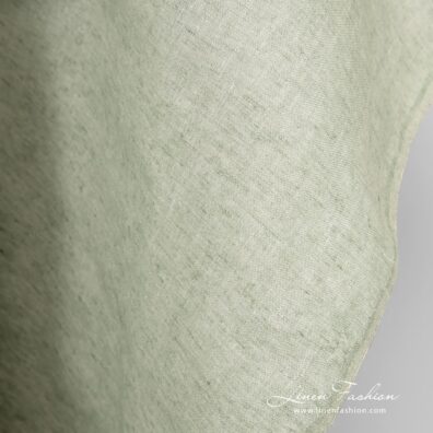 Greenish linen wide fabric in plain weave pattern