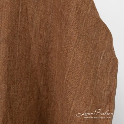 Striped linen fabric in brown color, washed