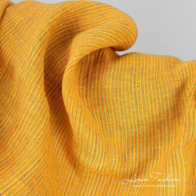 Yellow linen fabric in narrow stripes