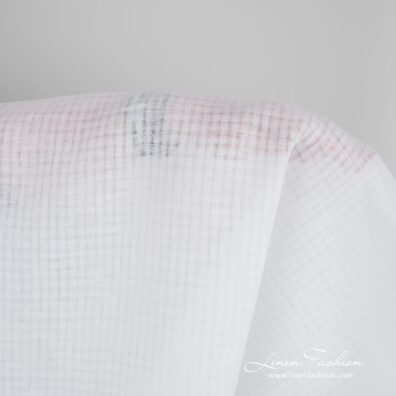 Optical white linen fabric in transparent checks, perfect for shawls, scarves, tablecloths and curtains