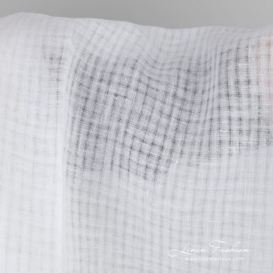 Optical white linen fabric in checks