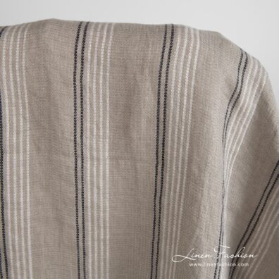 Grey brown linen fabric in stripes, specially washed to increase softness