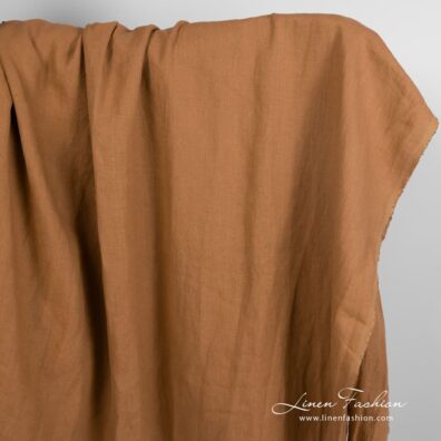 Linen fabric in clay brown color