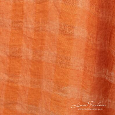 Orange linen fabric in transparent checks, perfect for clothes, curtains, scarves, tablecloths