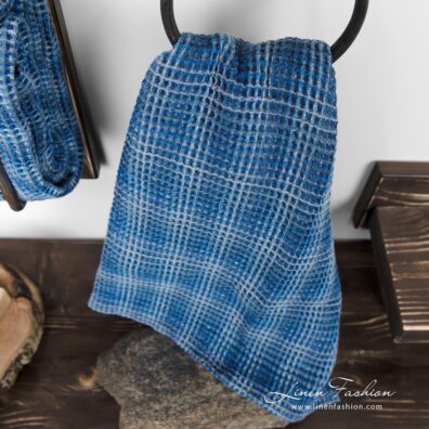 Blue linen cotton bath towel in waffle pattern