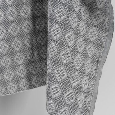 Grey linen cotton fabric in rhombus pattern, specially washed to increase softness