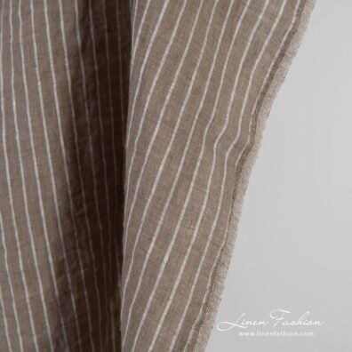 Brown linen fabric in stripes, specially washed to increase softness