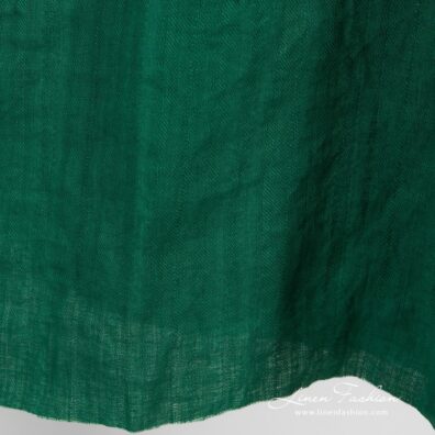 Green linen fabric in twills, specially washed to increase softness