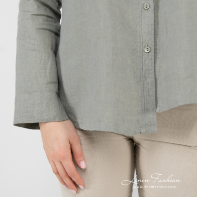 green linen blouse, asymmetrical bottom.