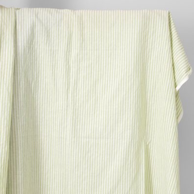 linen cotton light green striped fabric, washed.