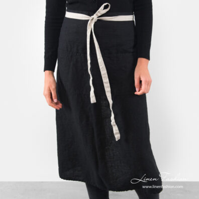 Long black linen apron with front pockets and gray waist tie