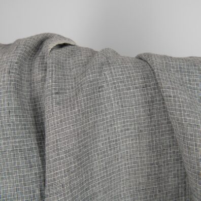 Linen fabric washed dark grey colour close up detail view