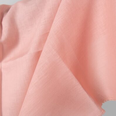 Linen fabric light pink colour close up detail view