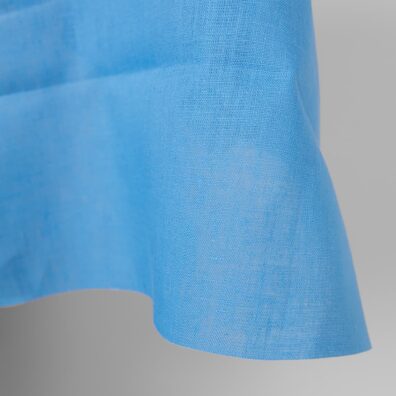 Linen fabric sky blue colour close up edge