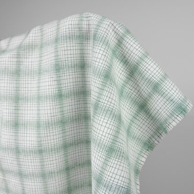 White linen cotton fabric with striped green checks product photo